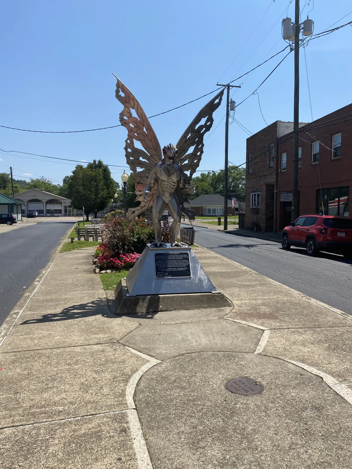 The stainless-steel Mothman statue standing in downtown Point Pleasant